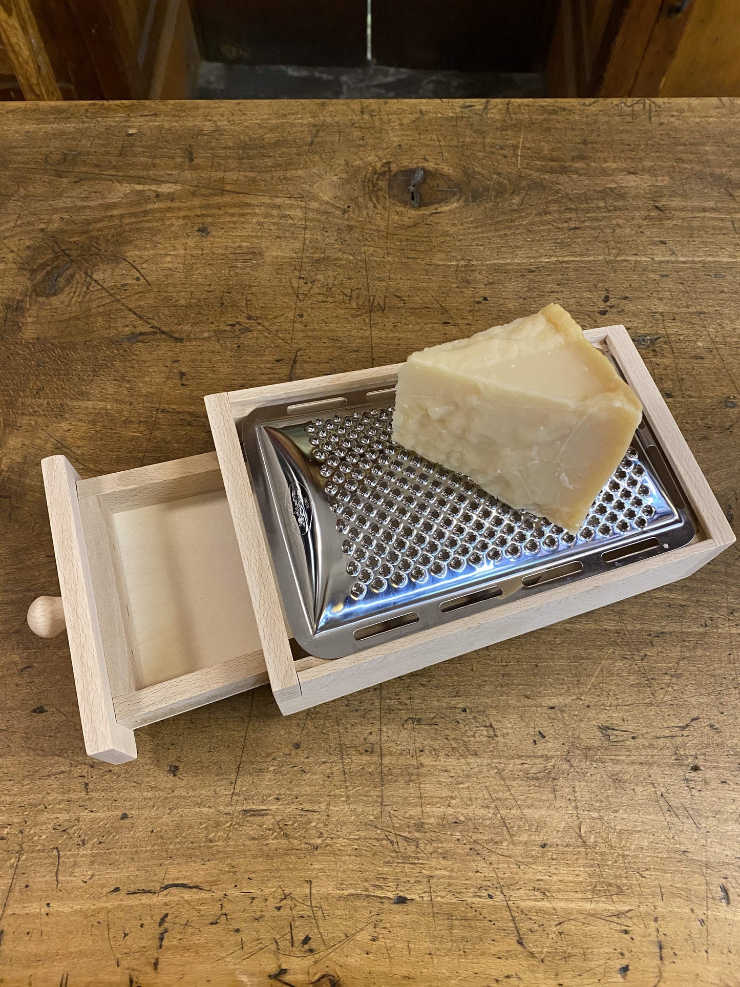 Wooden cheese grater