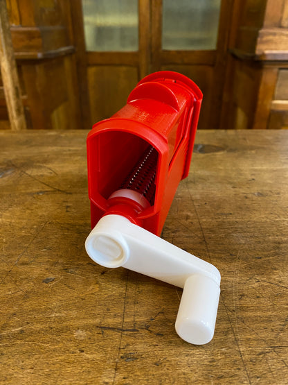 Grattuggia a manovella in plastica