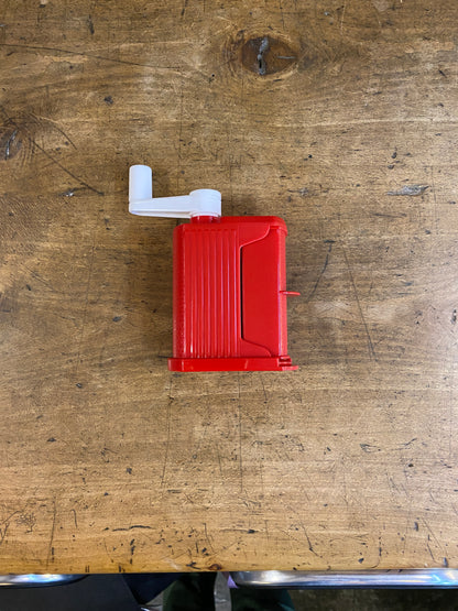 Grattuggia a manovella in plastica