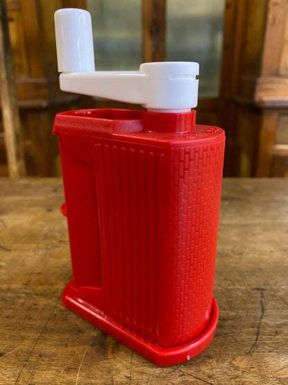 Grattuggia a manovella in plastica