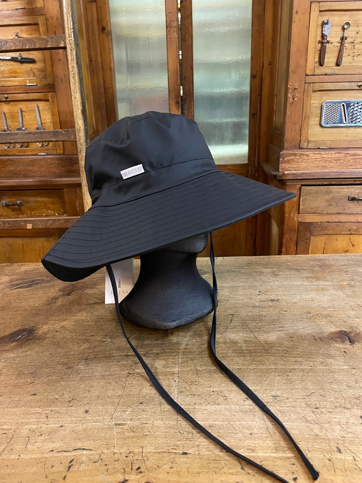 Cappello pioggia Rains