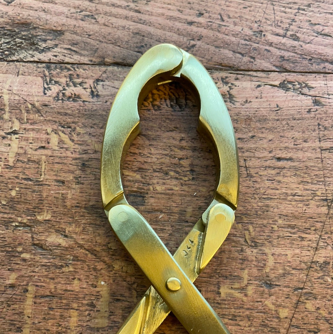 Brass nut opener