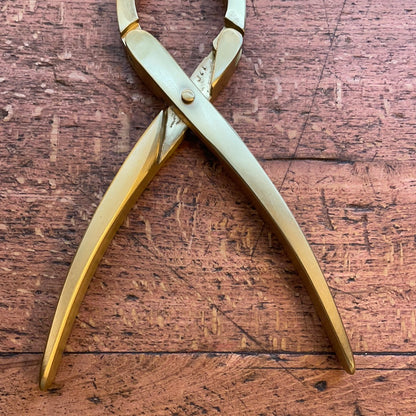 Brass nut opener